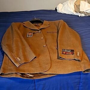 Light brown men's suit. Size 54L 48W. Super 100 Loriano Commection.